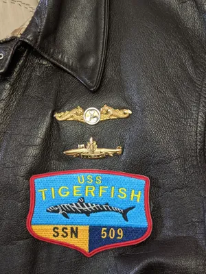Embroidered Patches - USS Tigerfish patch worn on US Navy goatskin A2 submarine jacket at a convention