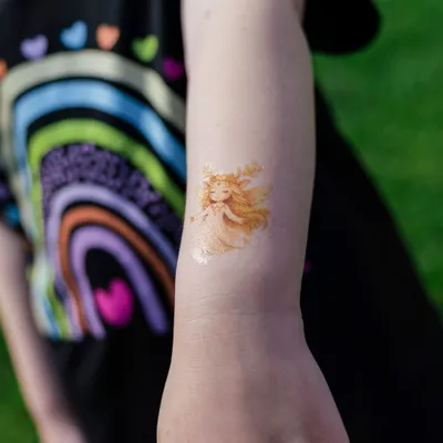 Custom Popular Tattoos - Child-themed golden angel tattoo