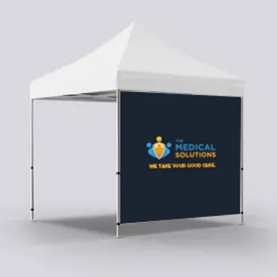 A white canopy tent with a custom printed back wall displaying 'MEDICAL SOLUTIONS - WE TAKE YOUR GOOD CARE' with a logo, likely intended for a medical trade show setup.